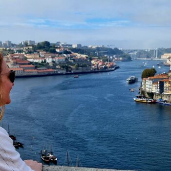 Sheridan looking over the river in Porto